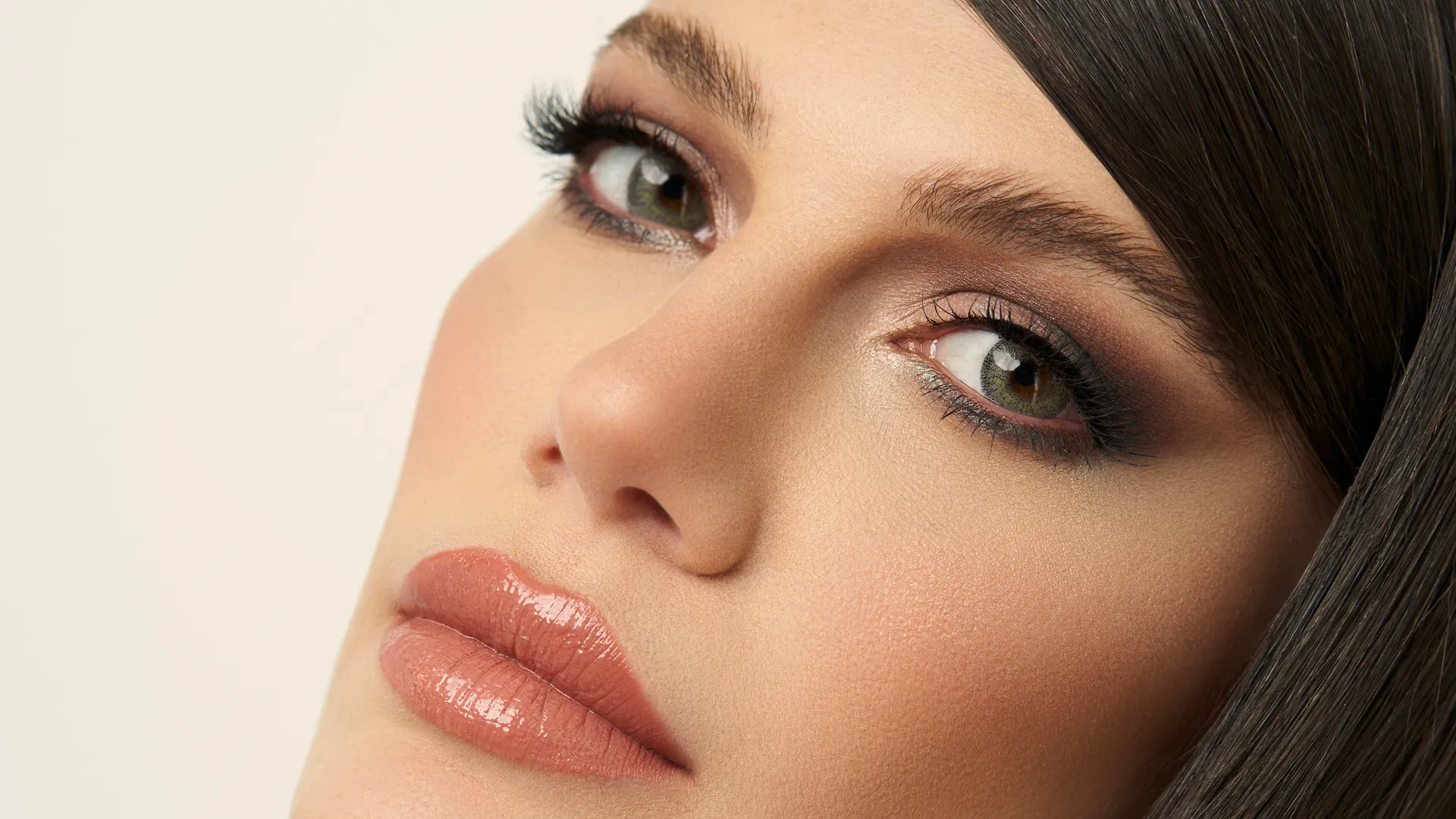 Close-up natural makeup and defined lashes
