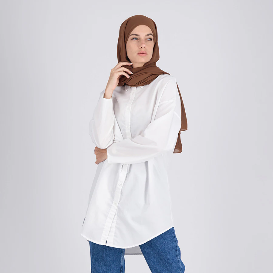 Woman wearing a brown Gomar Beauty chiffon hijab